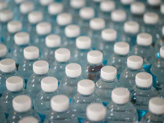 Filled bottles on a beverage line